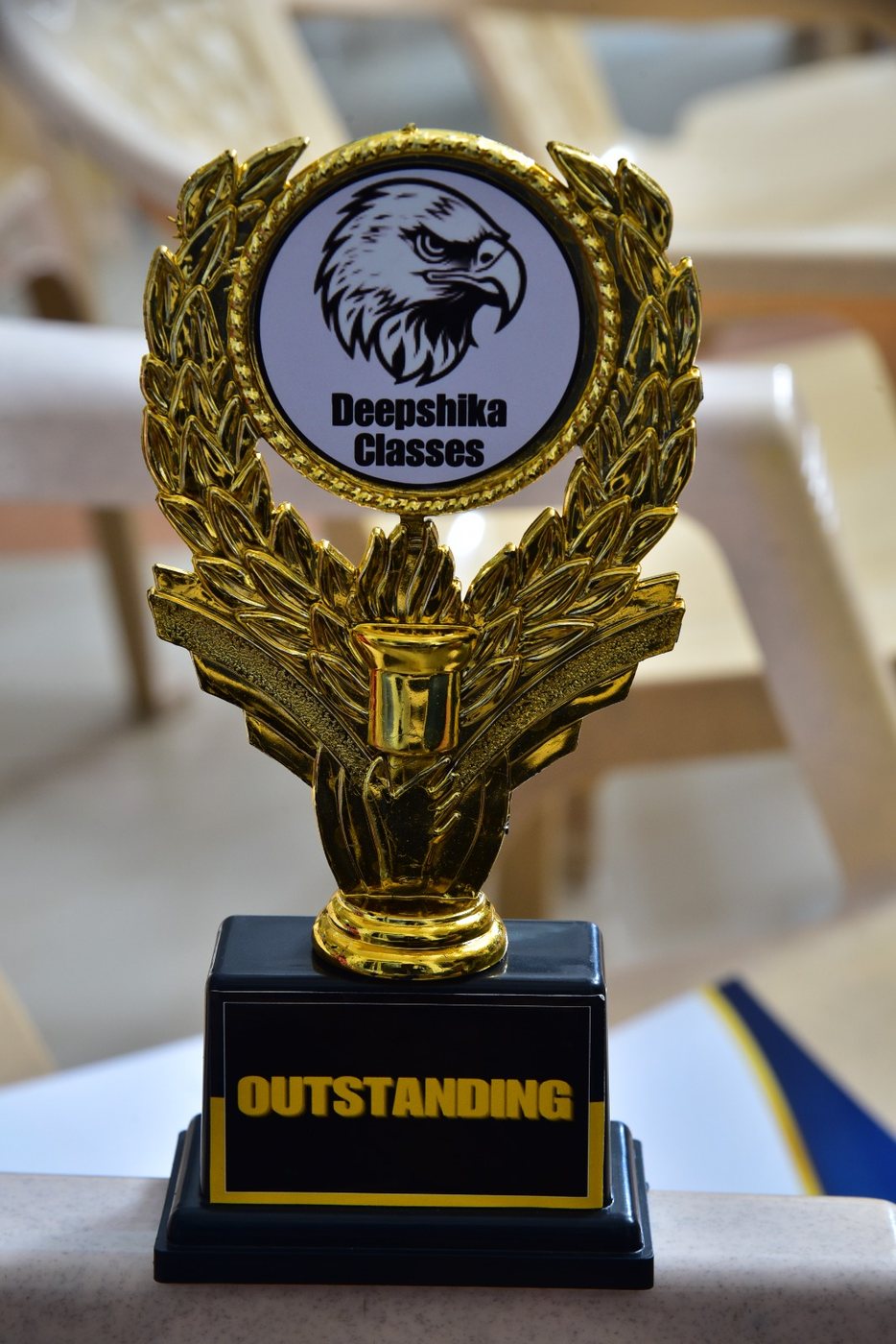 Outstanding achievement trophy awarded to a Sutrashikha Academy student